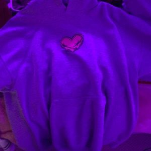 a grey sweatshirt with a cool design only worn 3 times, it’s a size medium